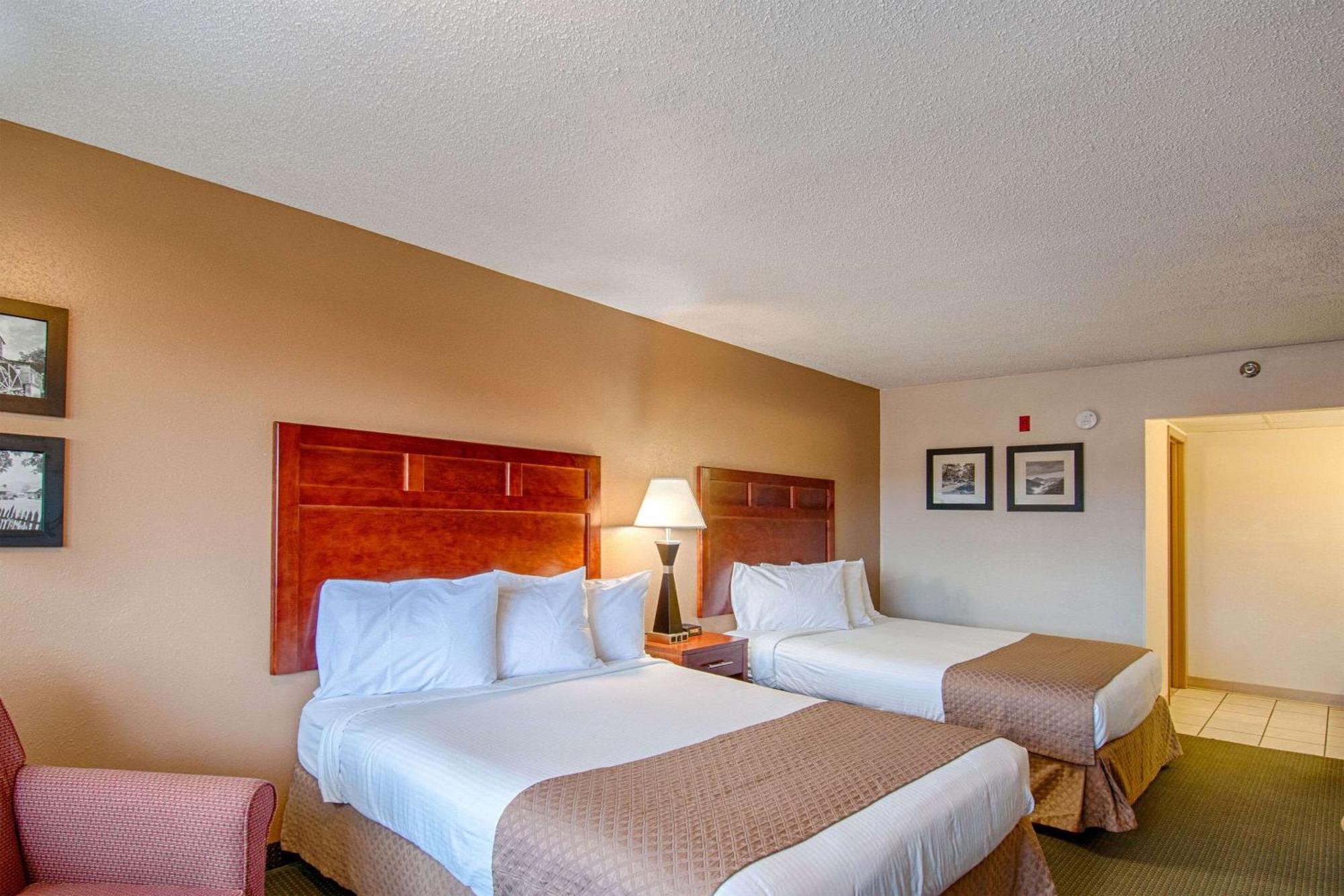 Quadruple Room Two Queen Beds Balcony Non Smoking or Interior Corridor